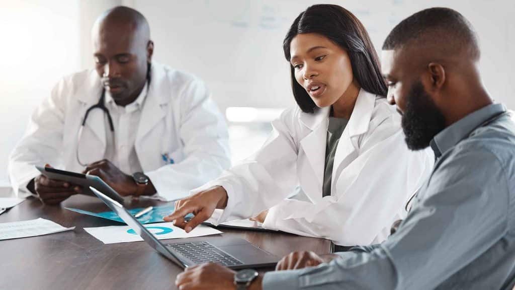 healthcare managers meeting between clinician and administrators