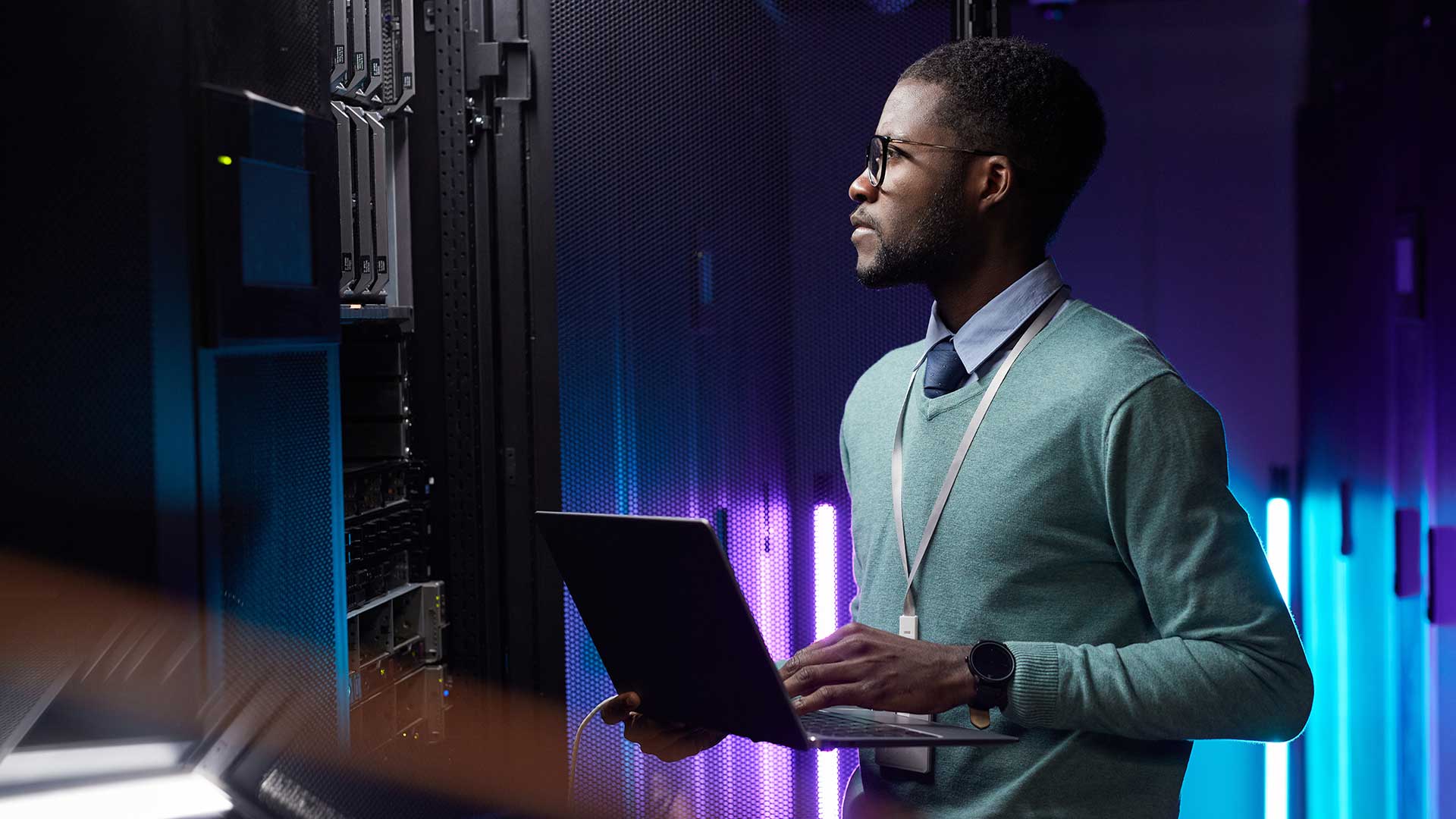 cloud computer engineer checks security on servers
